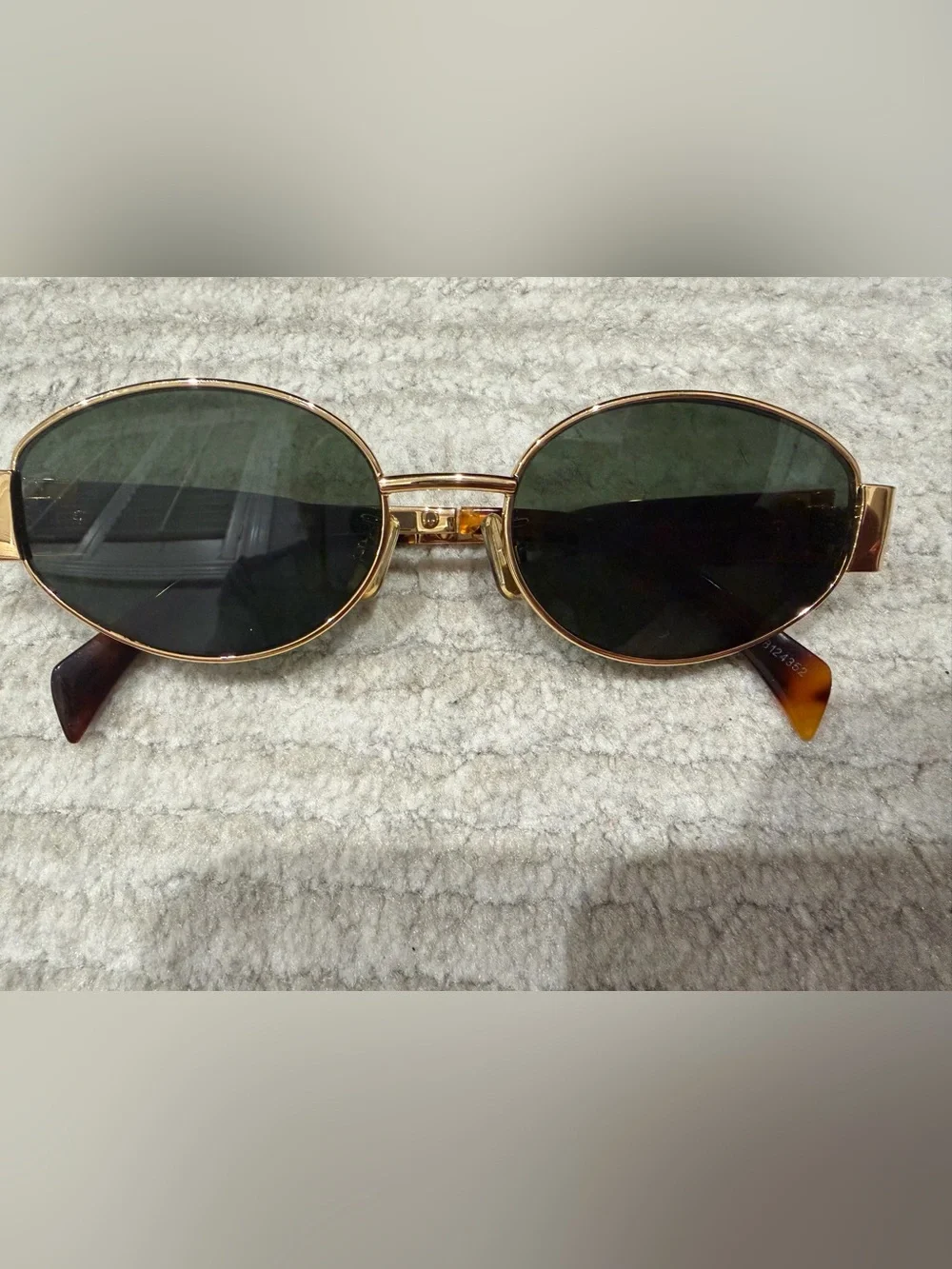 Gold Frame Oval Sunglasses with Dark Green Lenses